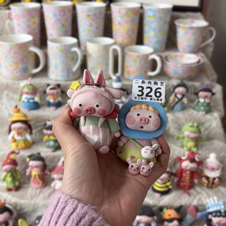 当***梨陶摆件两条肉可爱猪猪