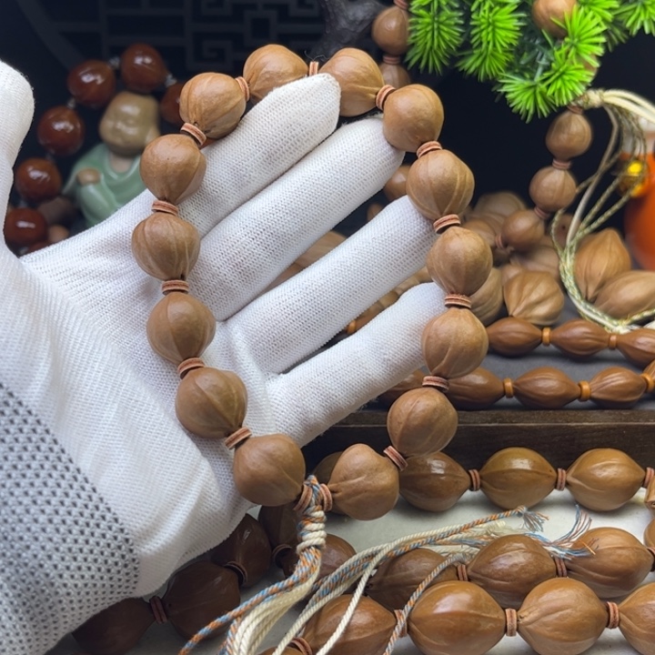 橄榄核手串/手链1.6*1.8原皮三花蒜头铁核