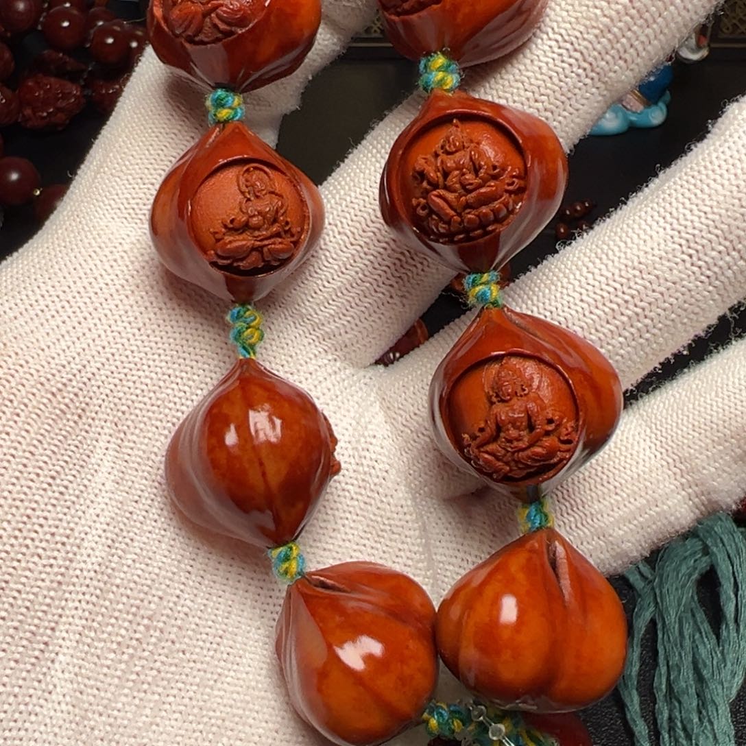 粮***心吊坠橄榄核橄榄核？！