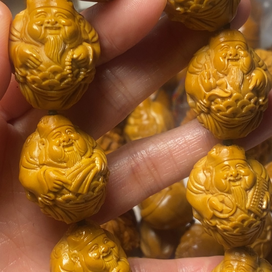 橄榄核手串/手链愤***鸟腰缠万贯财神