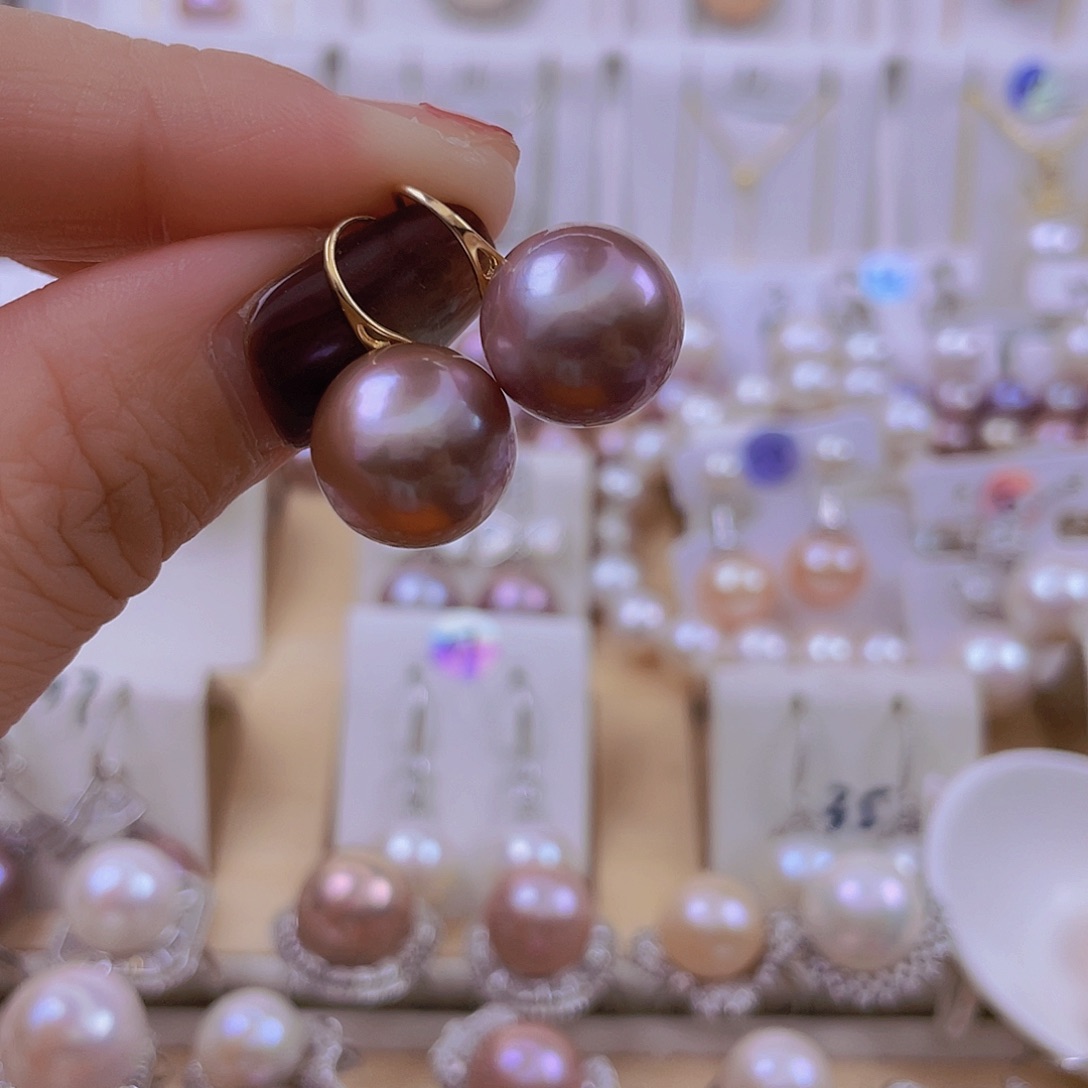 悠***悠淡水珍珠银S925镶嵌耳饰