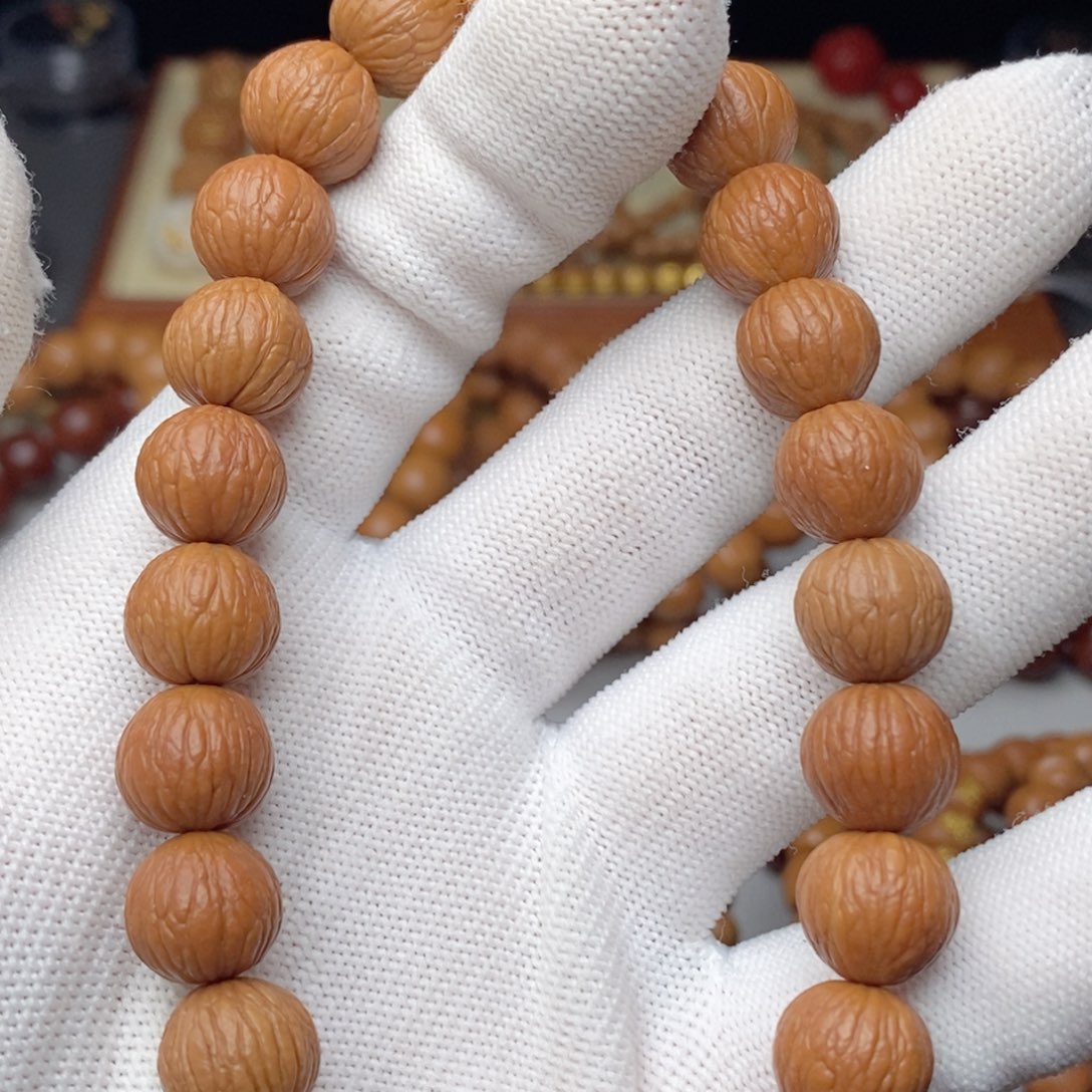 猴头核桃手串达*.凤羽