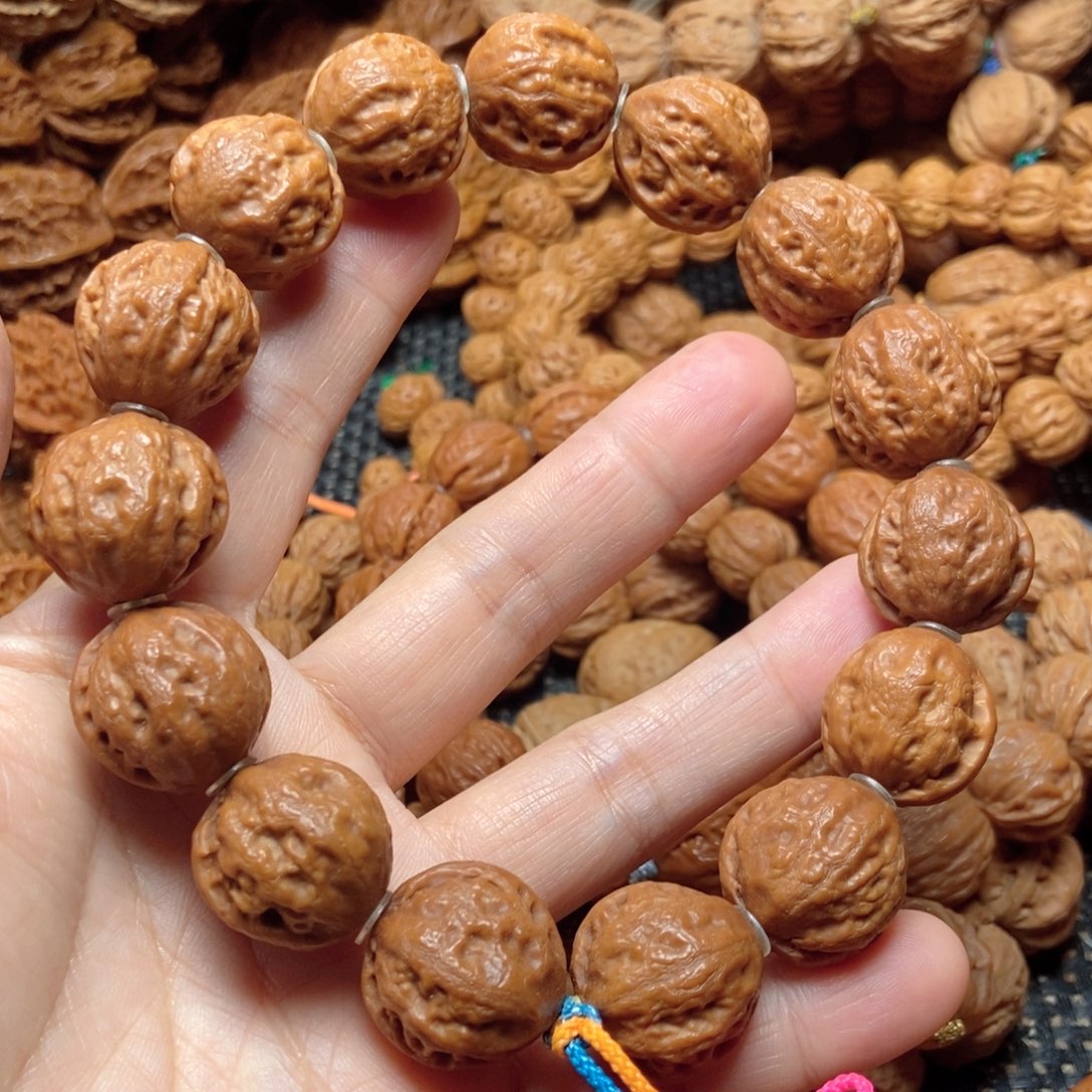 ****啊文玩核桃手串金豆子手串