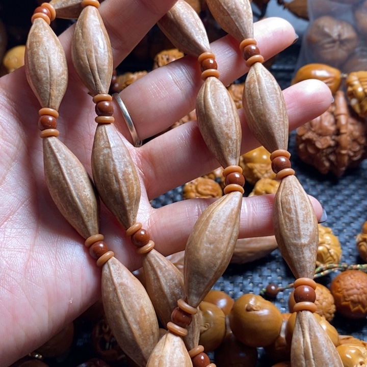 吊坠橄榄核家**矿柳叶素核