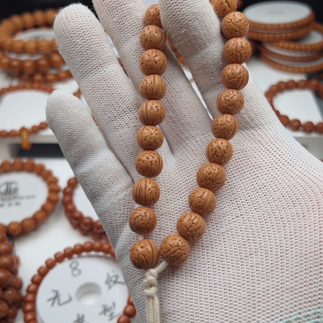 丁***丁吊坠桃核桃核手串