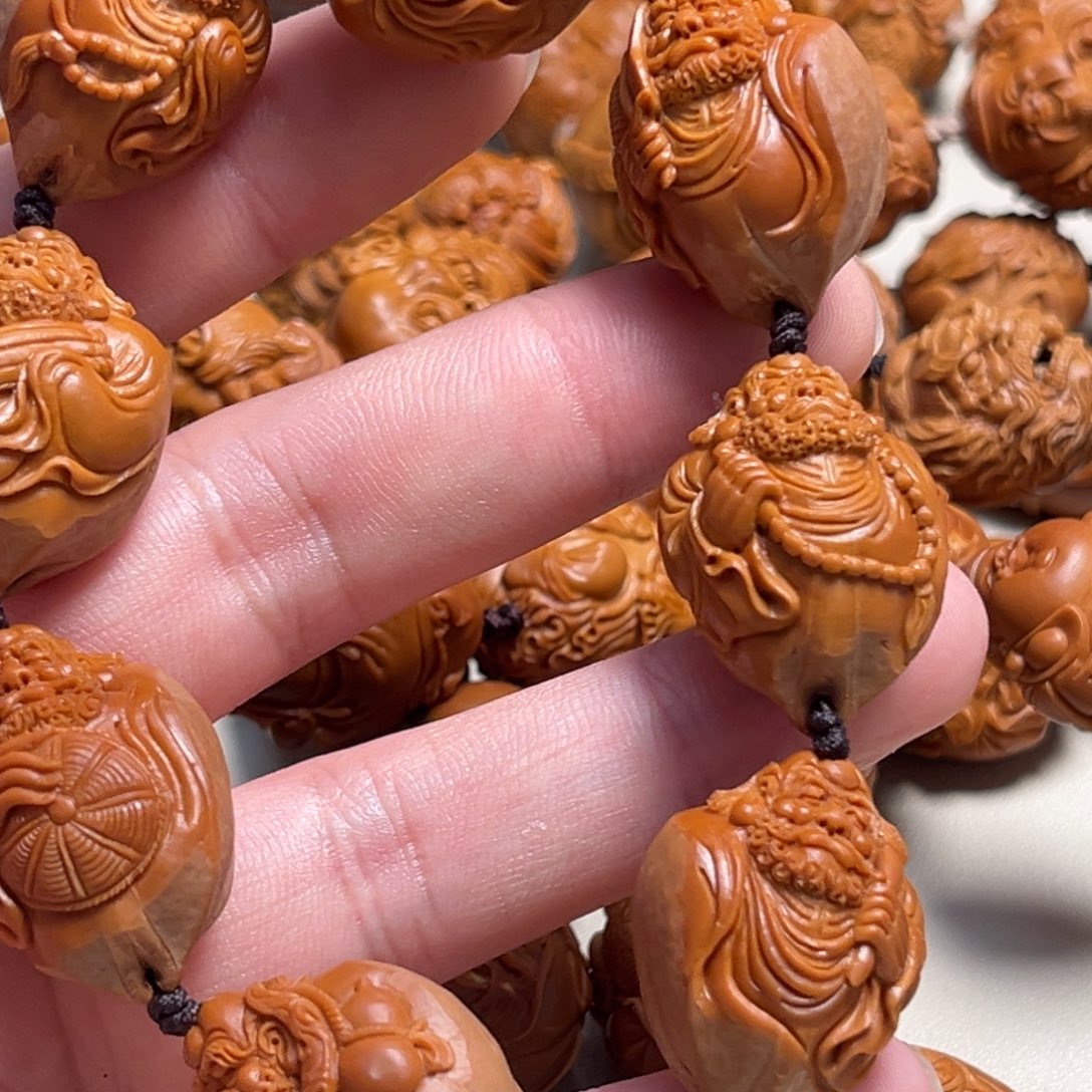 橄榄核吊坠洪*包衣达摩