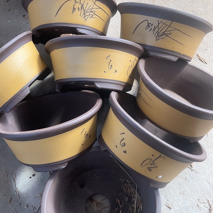 紫砂花盆100-8。   22-9