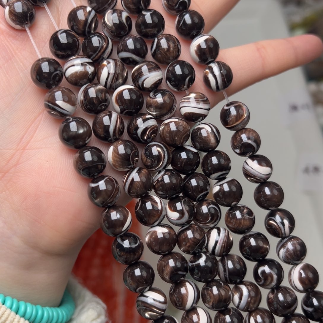 玛瑙/玉髓合金珠宝半成品K652。10mm天然黑金贝圆珠一条