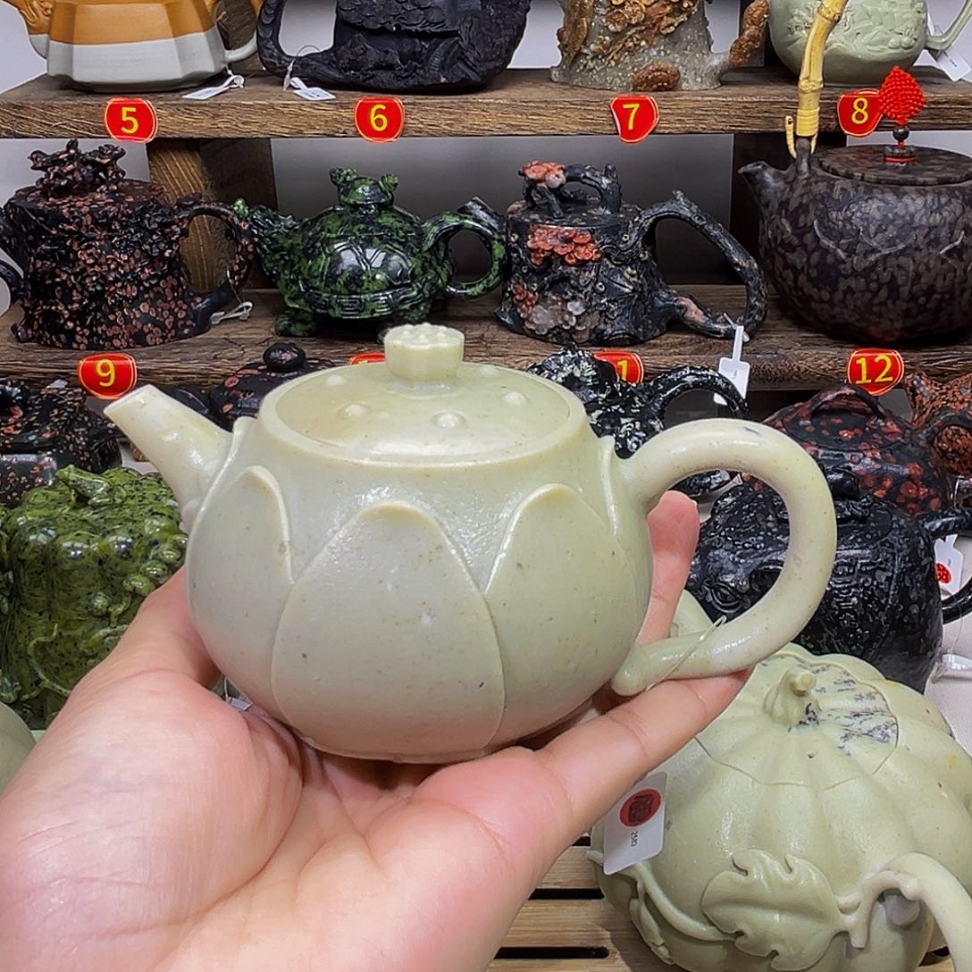 为***来石材冰碛玉莲子壶