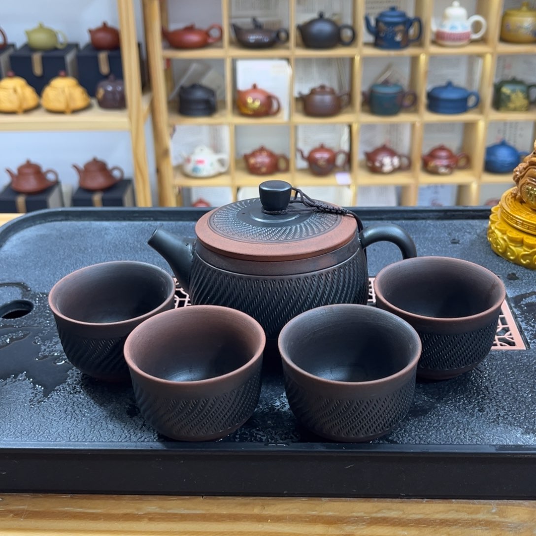 紫砂紫砂紫陶跳刀汉瓦（一壶四杯）