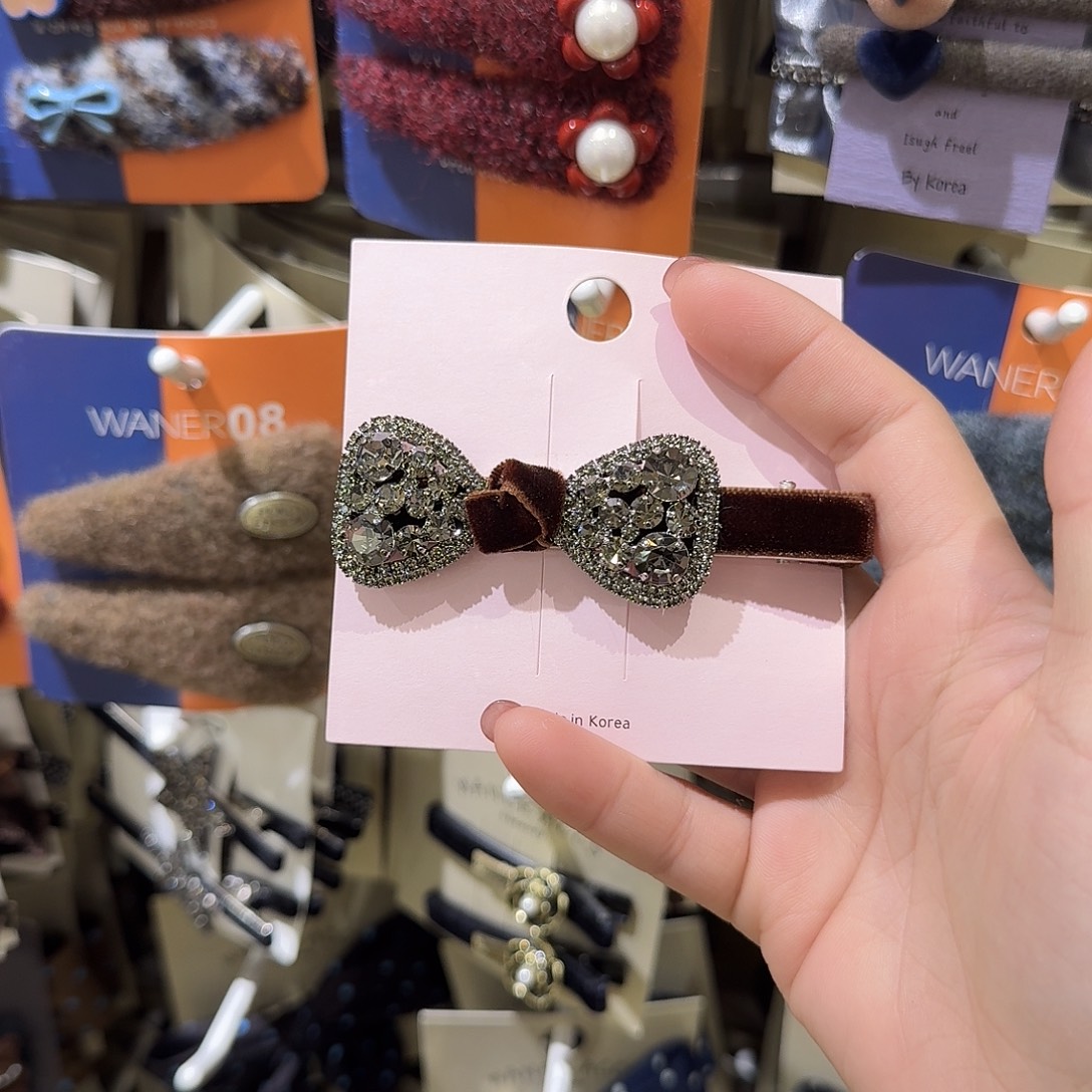 布艺非金属咖色蝴蝶结鸭架