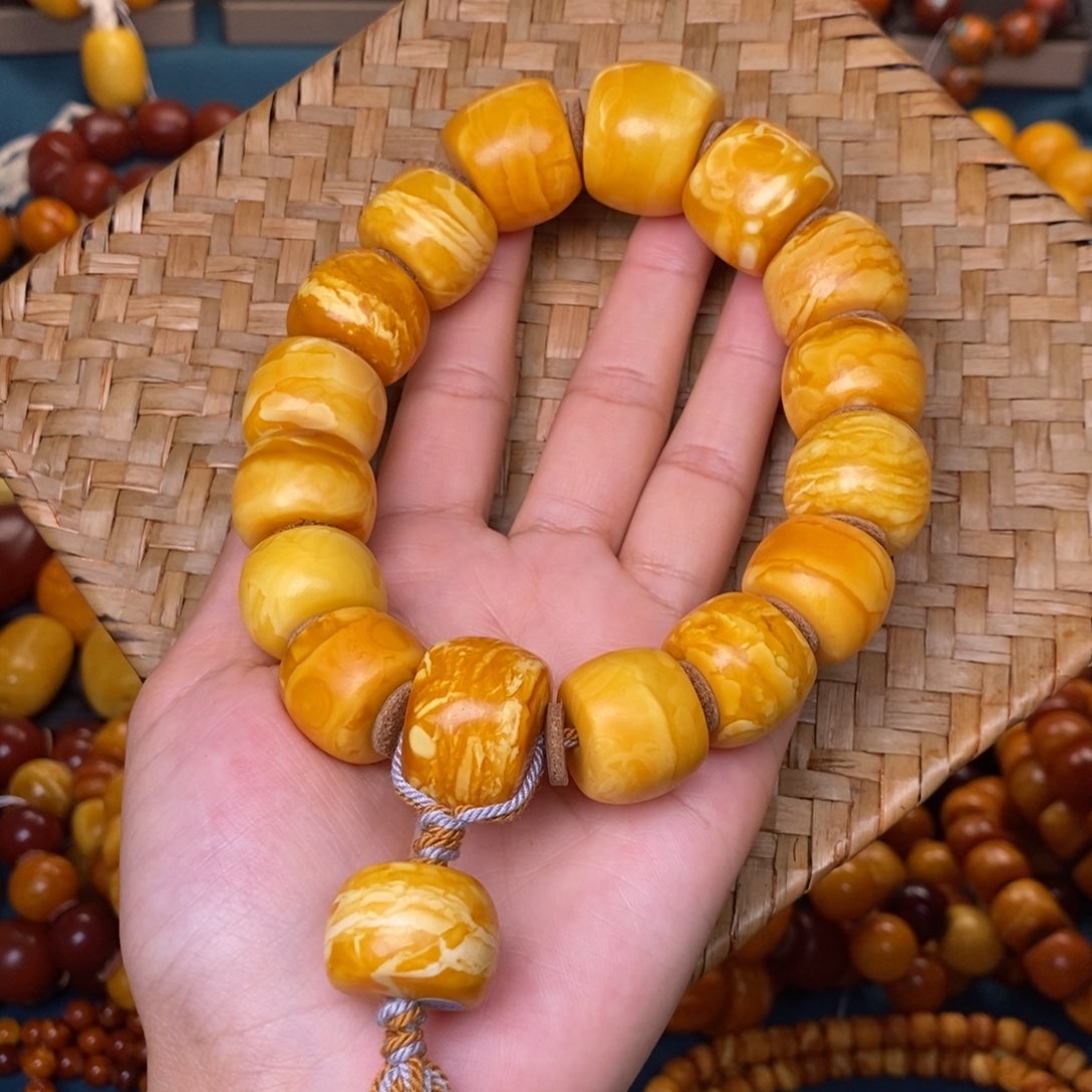 蜜蜡裸石未镶嵌九*?蜜蜡