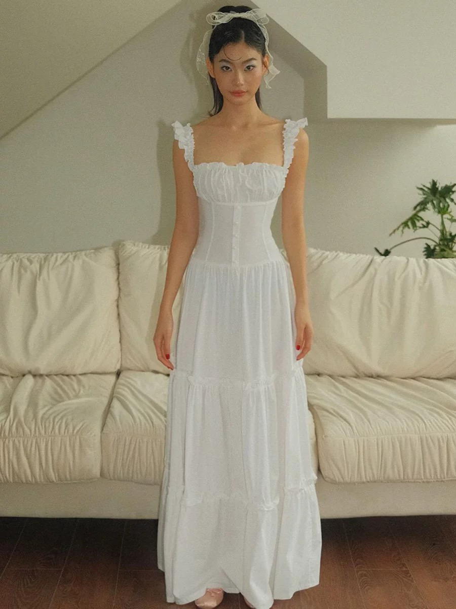 越南设计师Vintageg 吊带单排扣装饰收腰大裙摆气质连衣裙