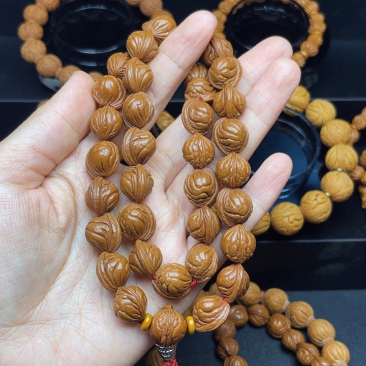 杨***墨吊坠桃核玉龙脊^_^