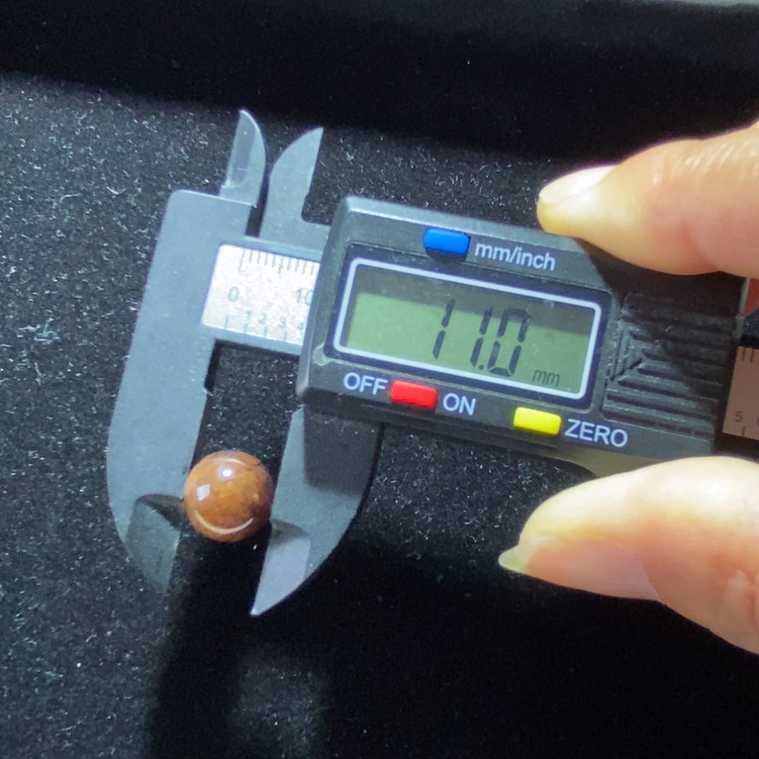 苏***苏未镶嵌琥珀裸石根珀珠11 mm打1.0孔