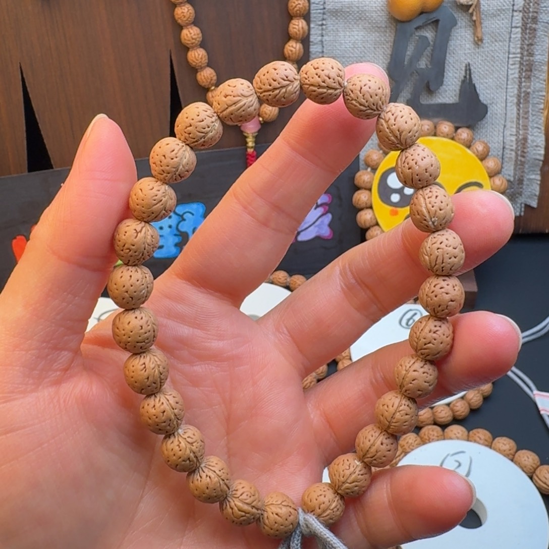 桃核吊坠9野生桃核肥脐手持