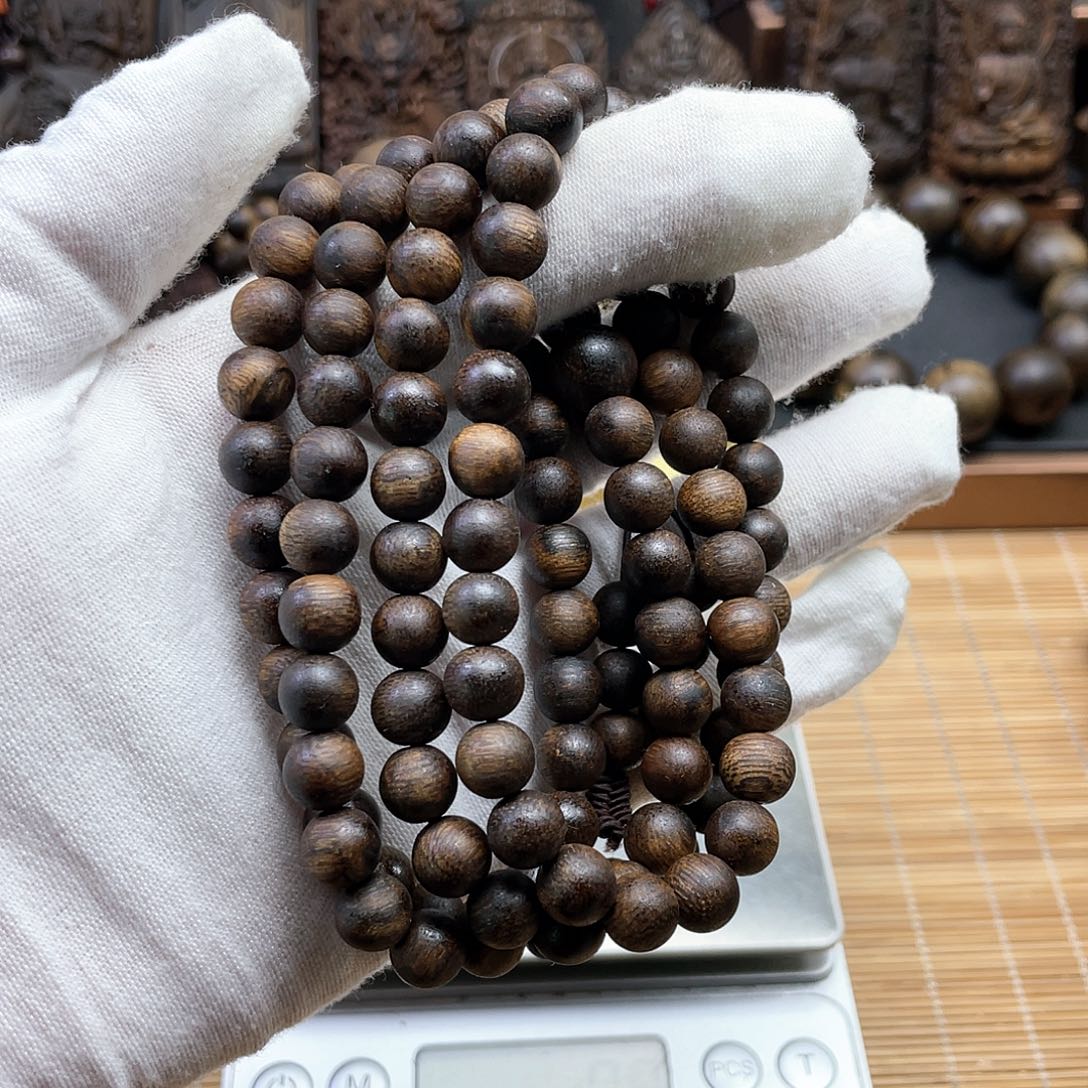 沉香手串酒***颜芽庄紫奇