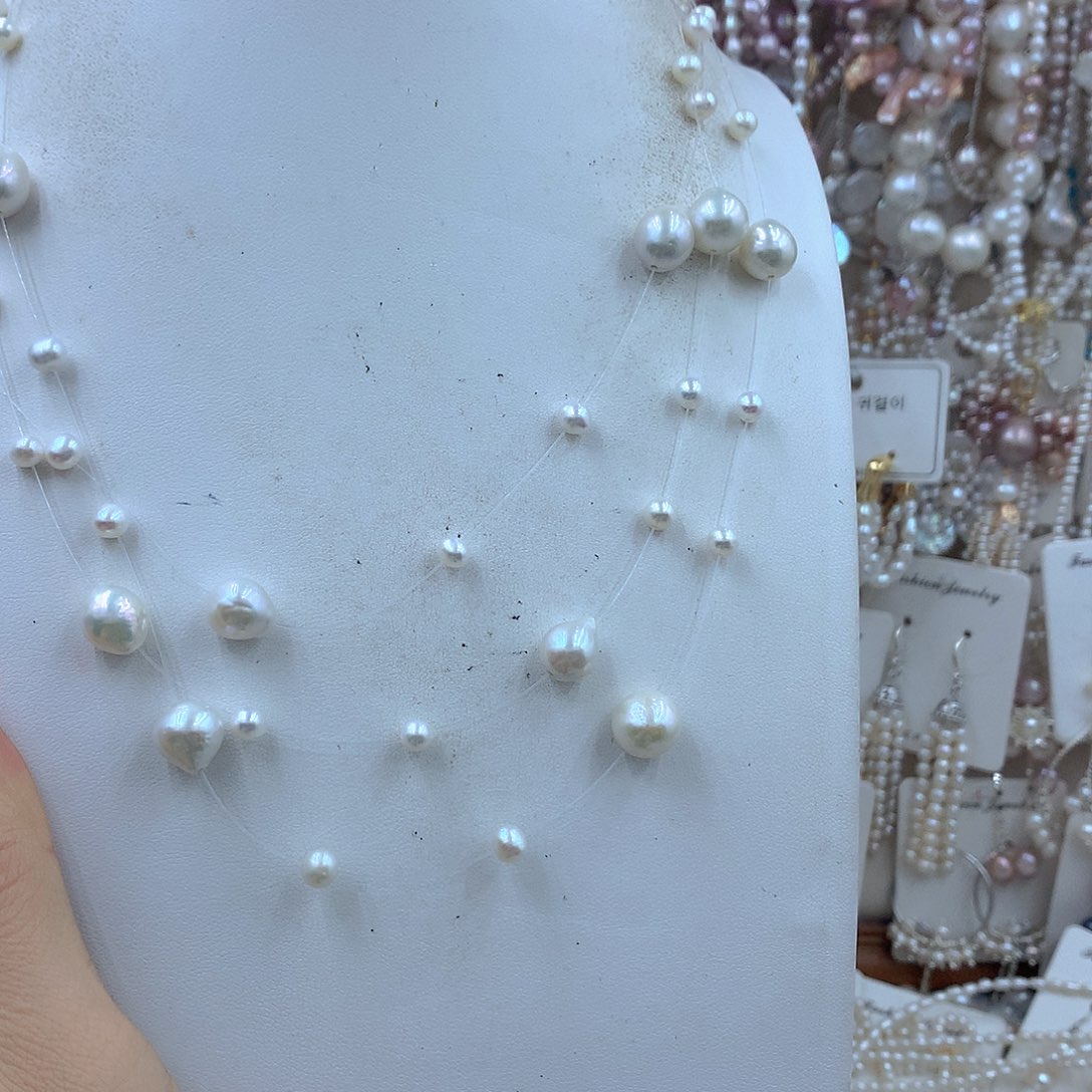 叶***馨银S925镶嵌淡水珍珠耳饰