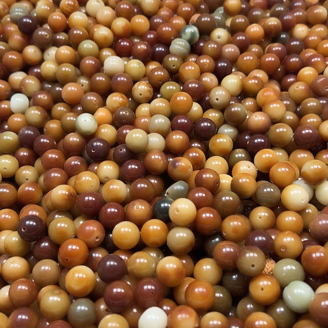手串菩提根/象牙果瑕疵非料虎破圆2500颗左右