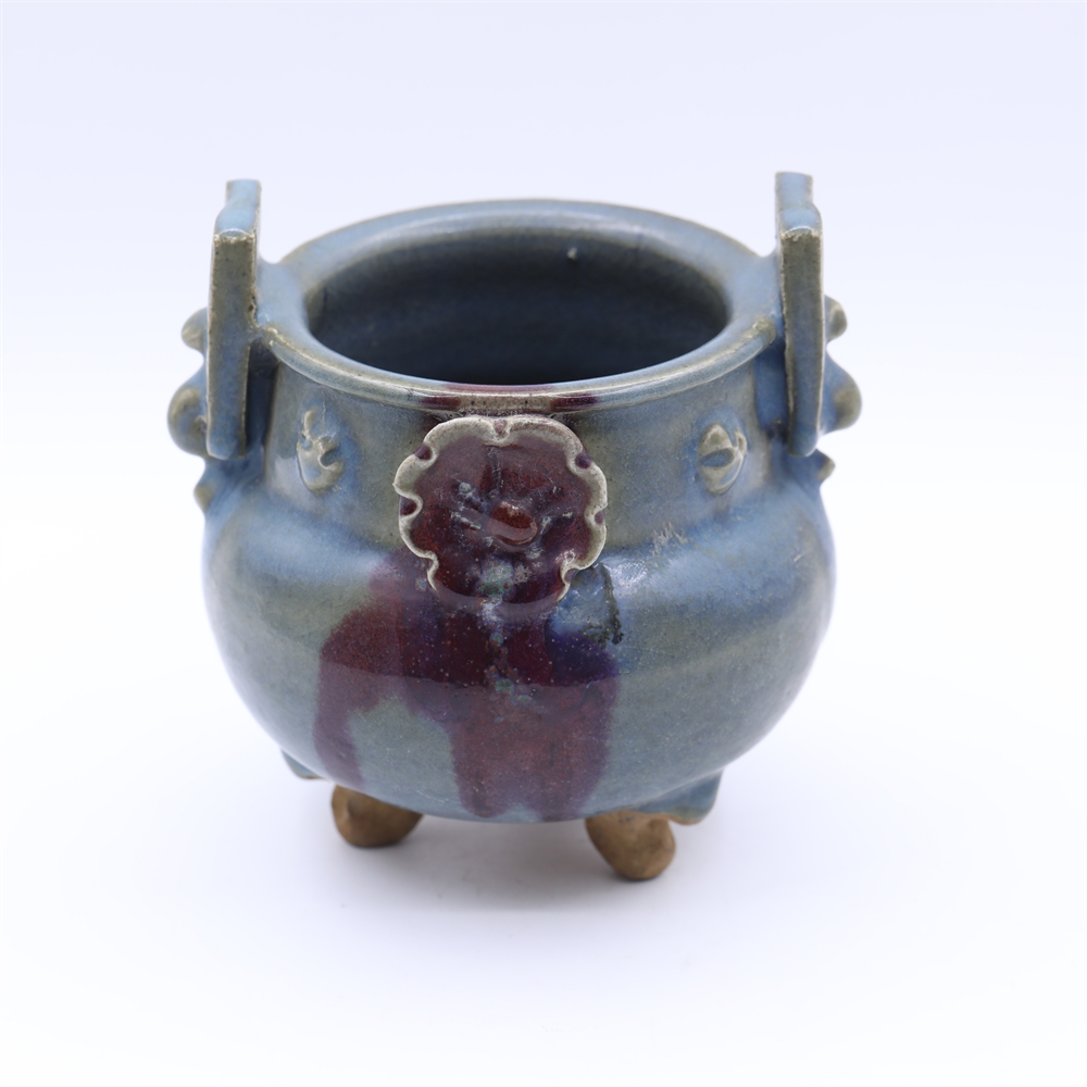 古陶瓷/ 钧窑窑变釉双耳贴塑花卉纹三足炉LOT4245