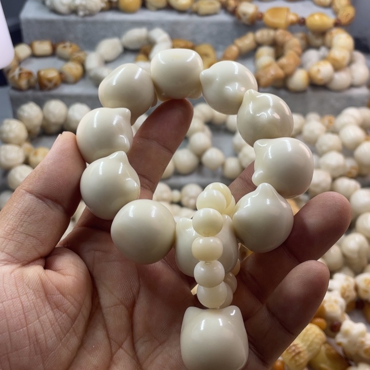 吊坠菩提根/象牙果全品象牙果猫头手串卡22