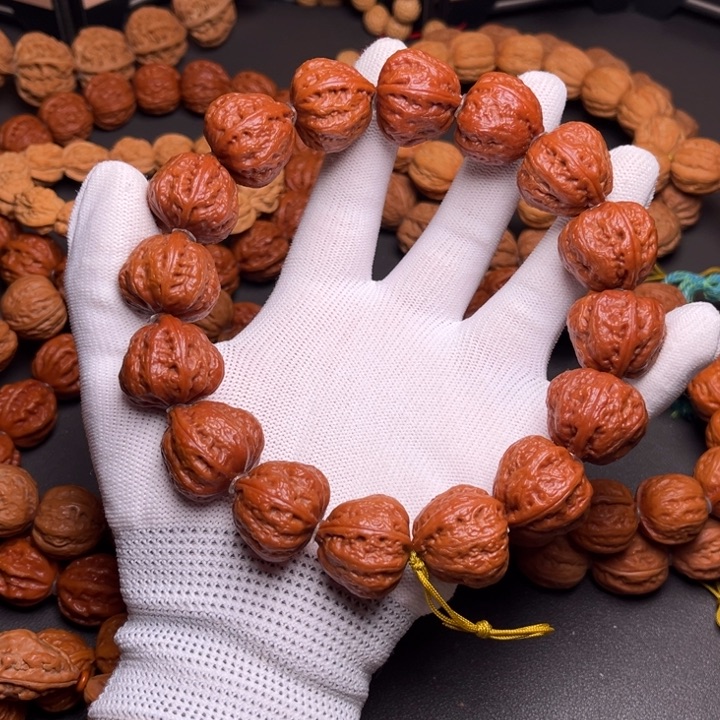 a***心手串文玩核桃糖三角