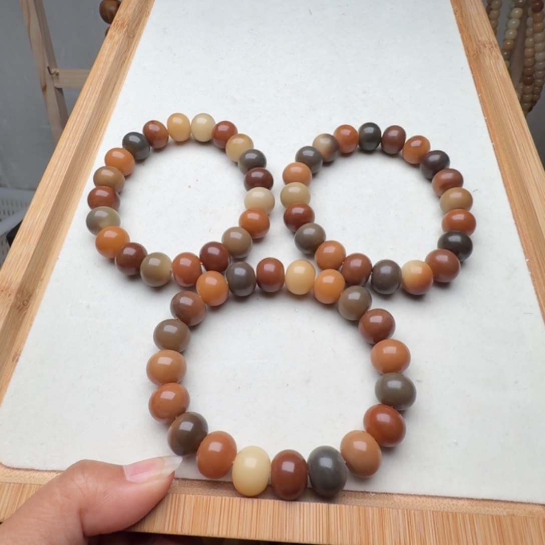 淡***然手串菩提根/象牙果卡13算盘福利