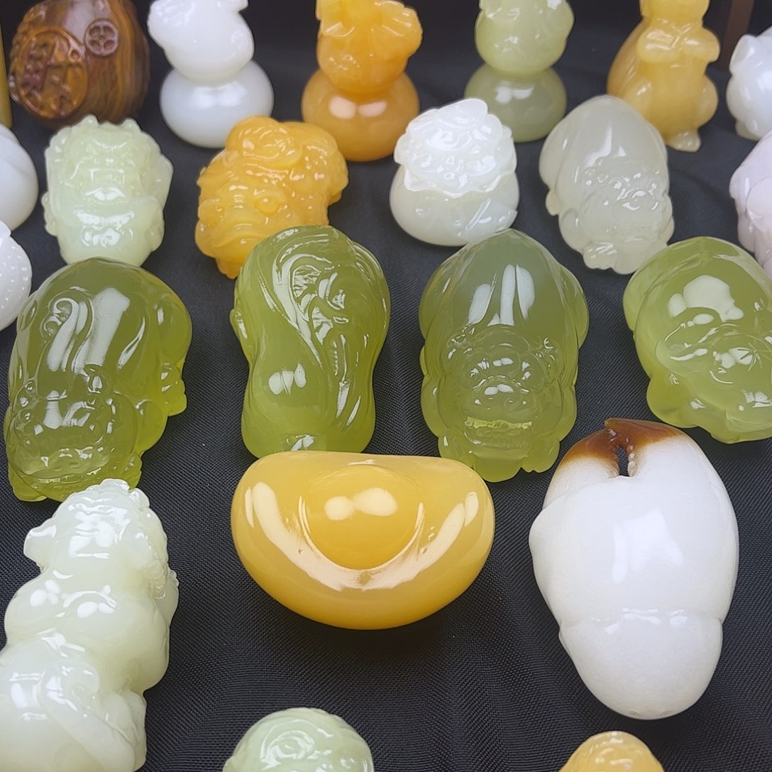 卧***生昆仑玉石手把件碧玺（处理）