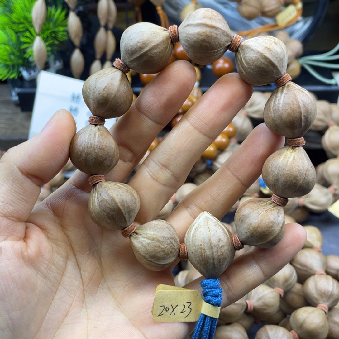 小***辣橄榄核吊坠20x23红核