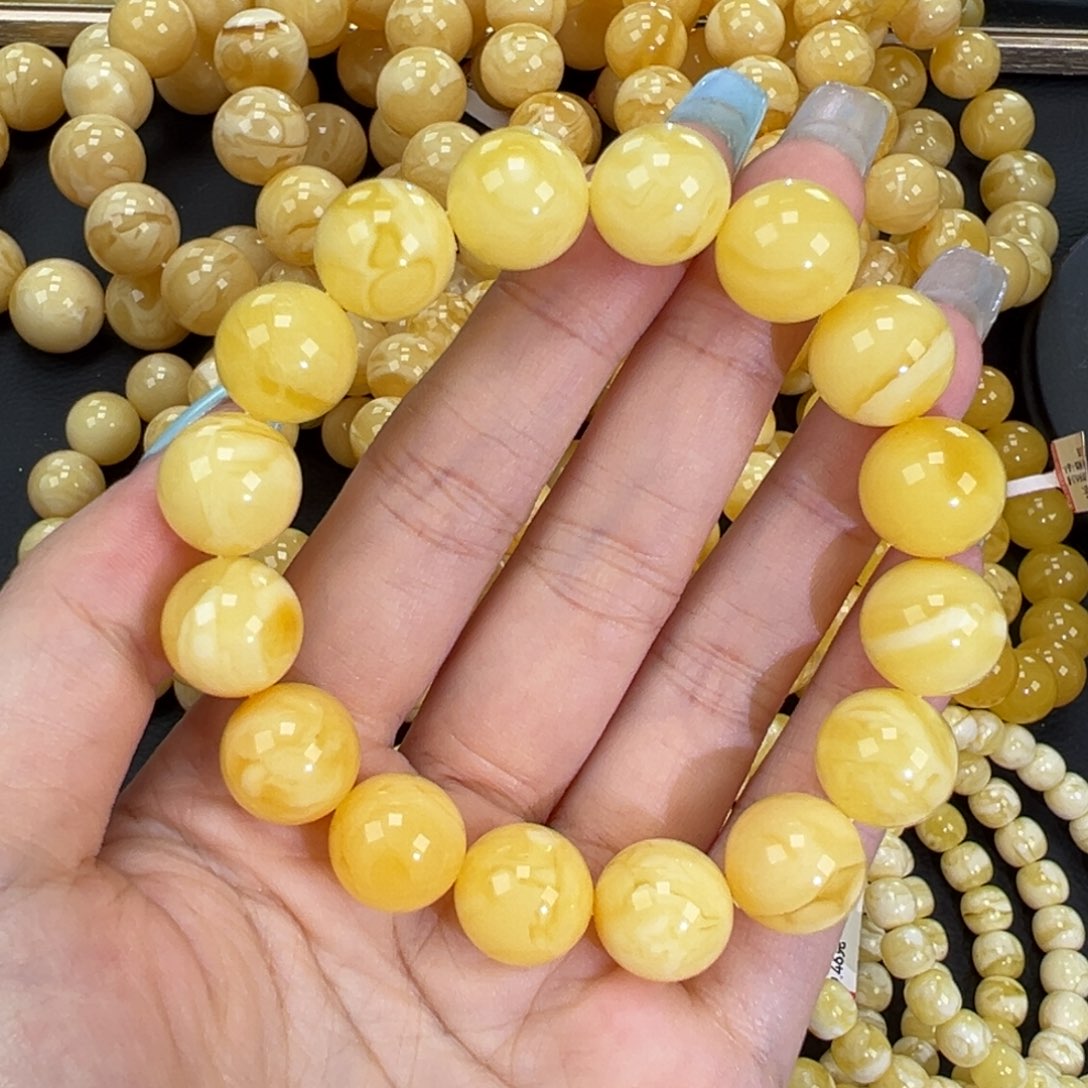 琥珀未镶嵌手链23.2黄白妖花