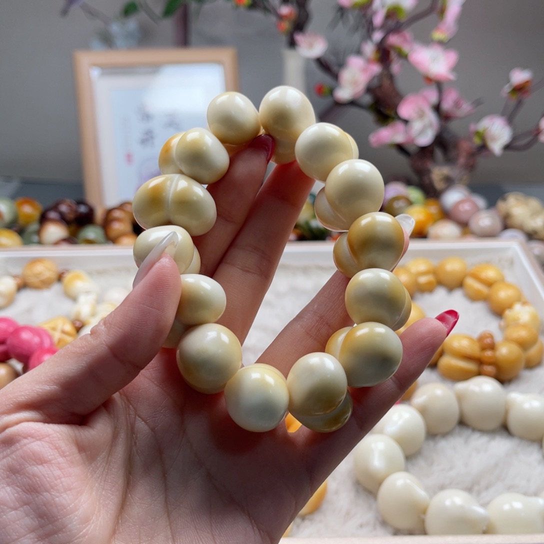 吊坠菩提根/象牙果花**?Q874象牙果屁桃单圈通货