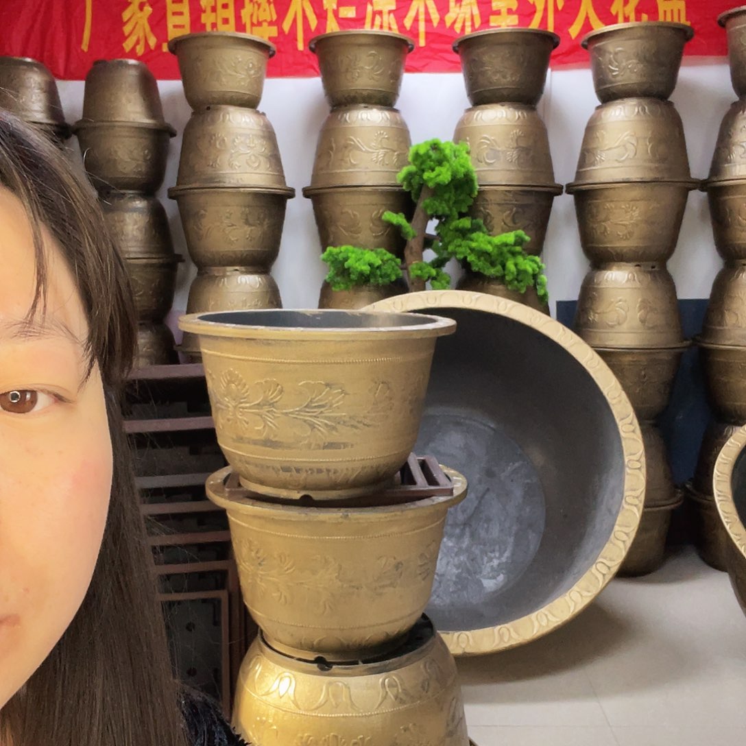 滕***天73紫砂色花盆两个都打孔