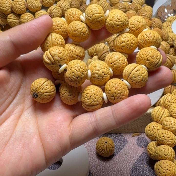 婉***兰桃核手串盘锦肌肉