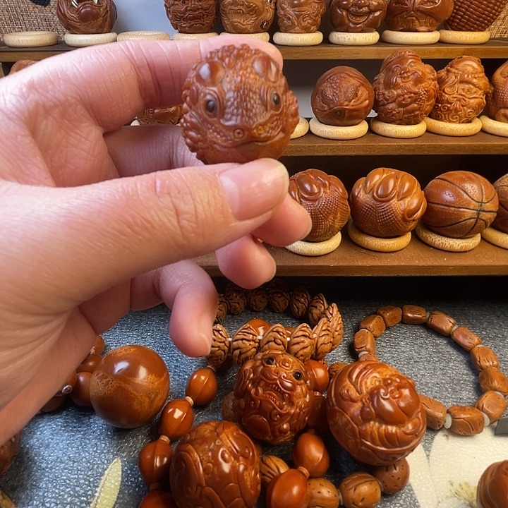 f***e橄榄核吊坠手把件一个