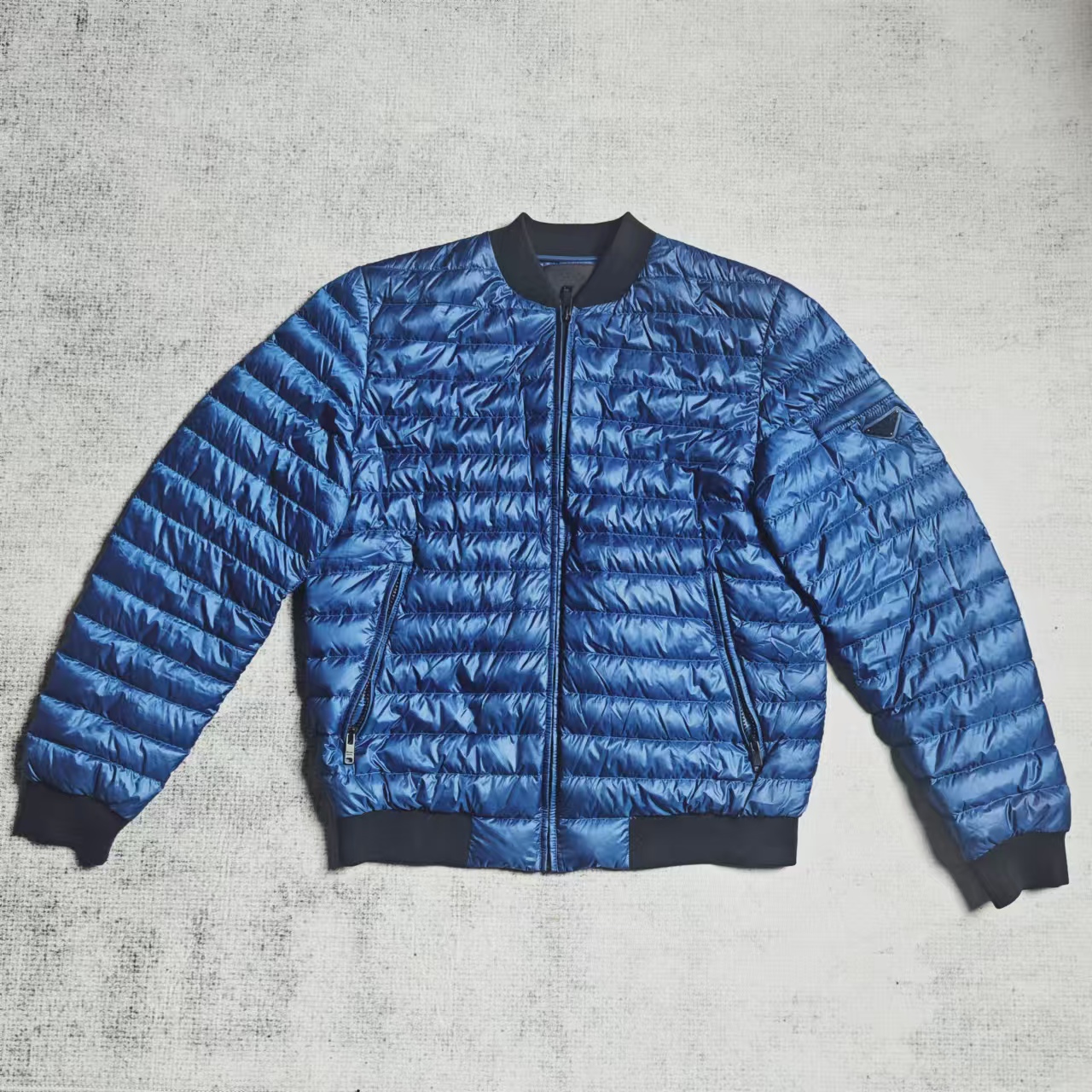 99新 Prada/普拉达 蓝色时尚羽绒服 48码 99新