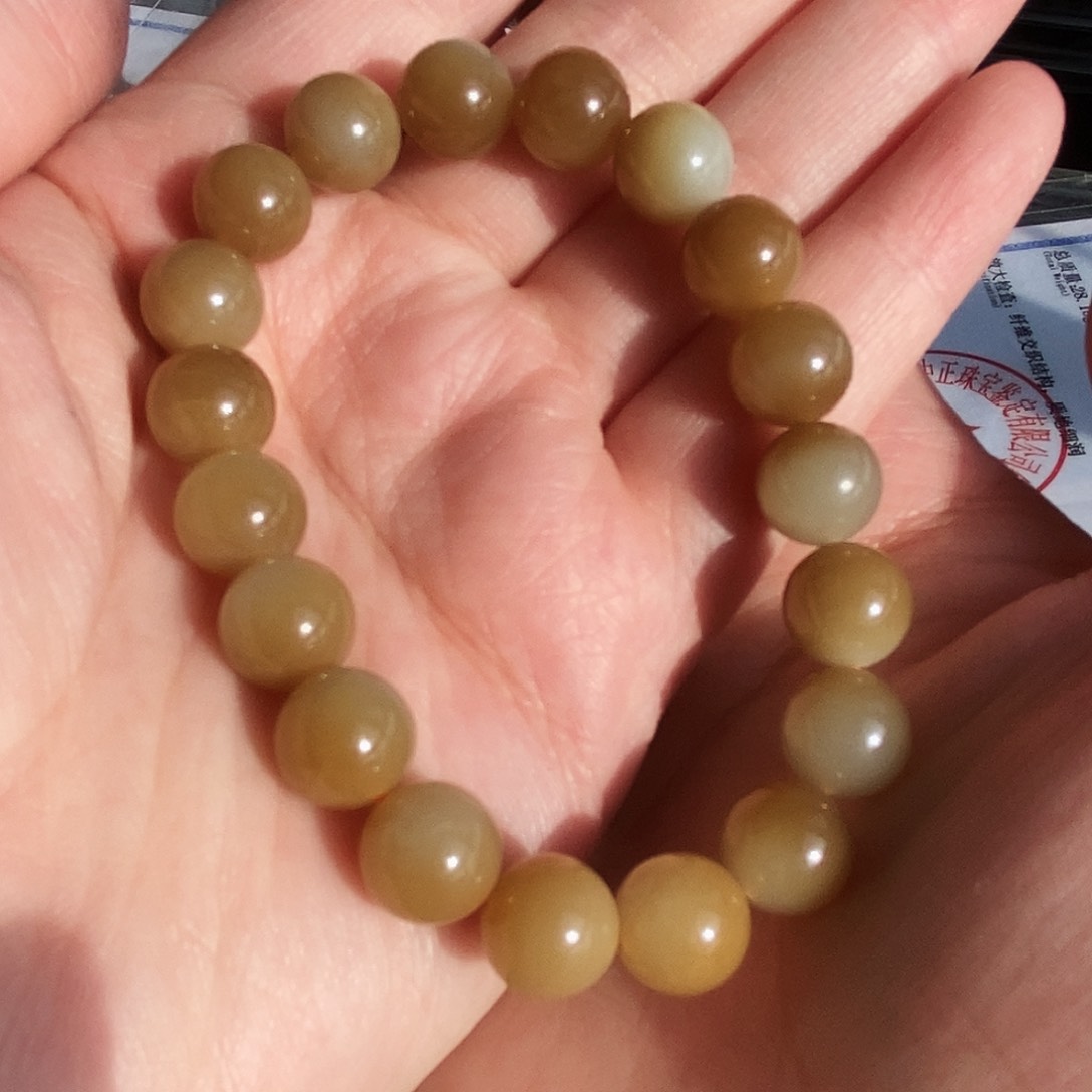 和田玉手链未镶嵌阿**达10mm且末糖