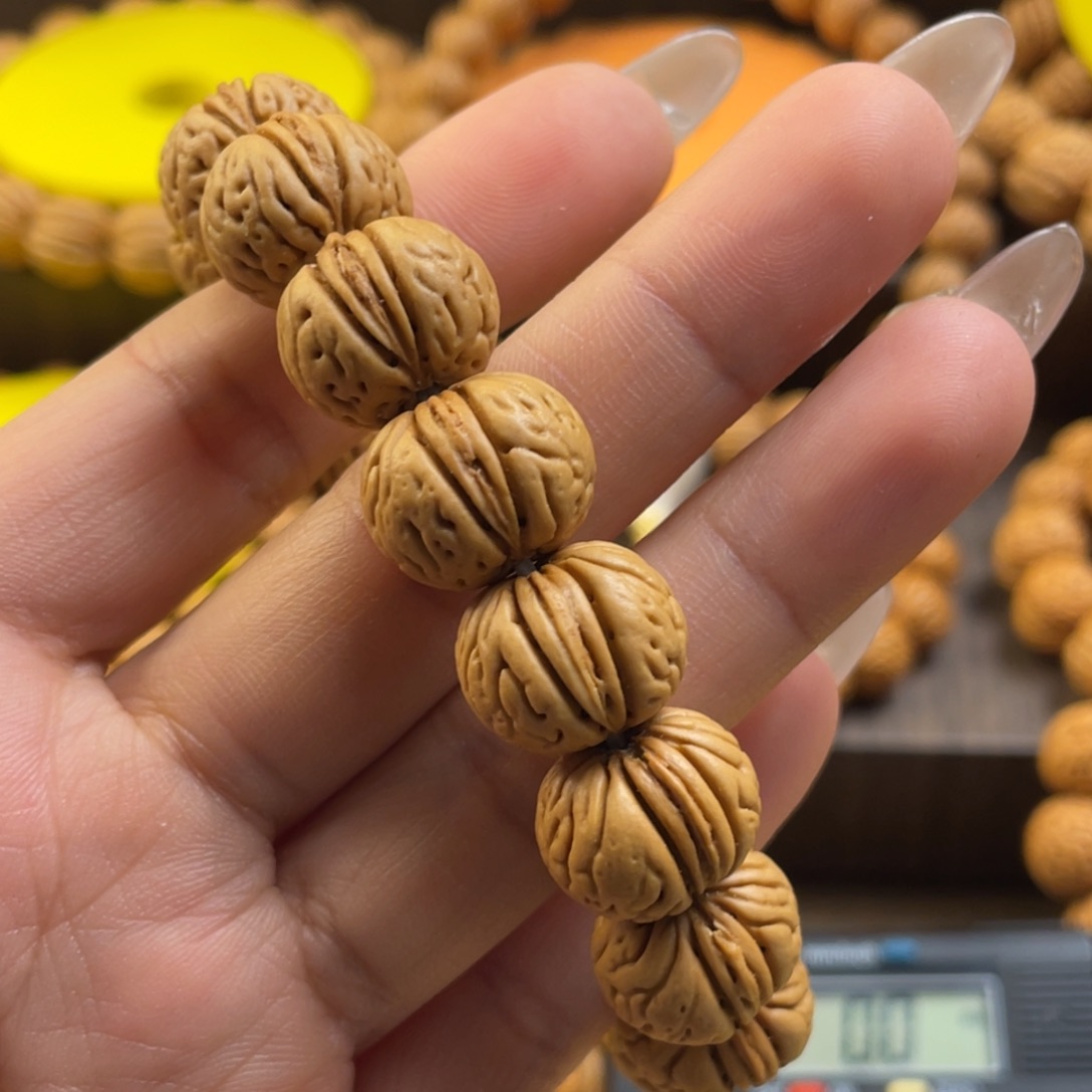 桃核手串风***光肉纹元宝