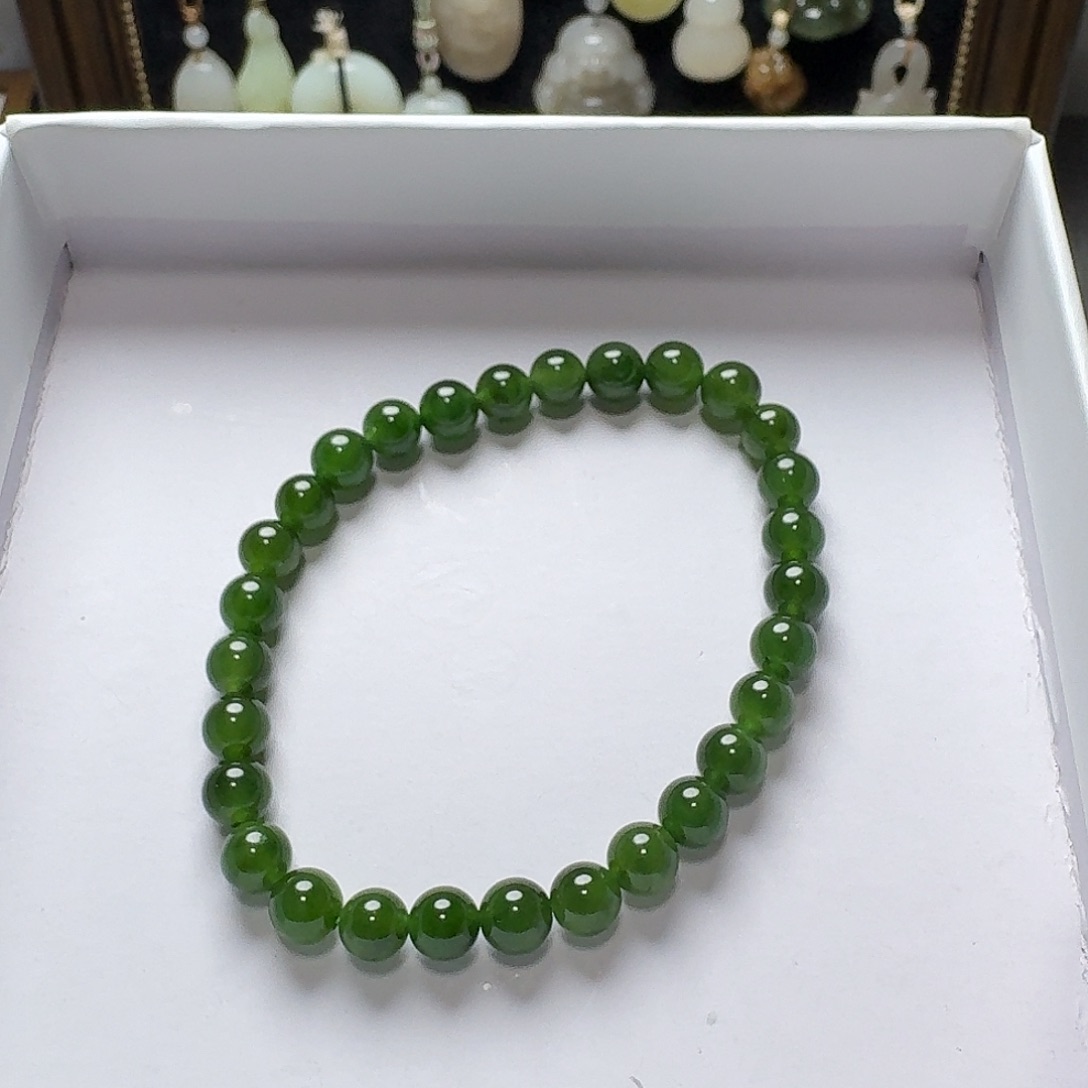 壹***三石英石非金属卡6辣绿单圈手串