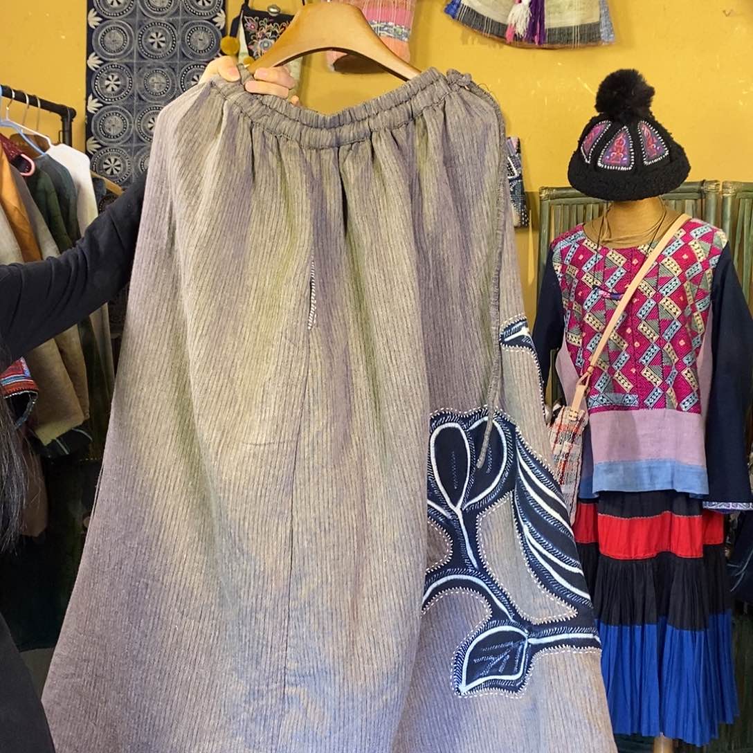 织绣红****营手工制作包包