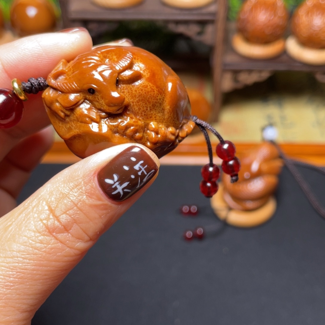 橄榄核吊坠牛掰穿配