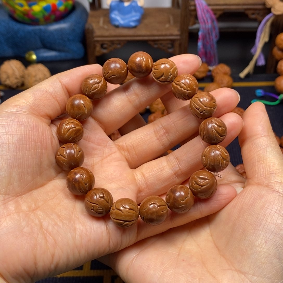 桃核手串?****﹏小龙纹光珠