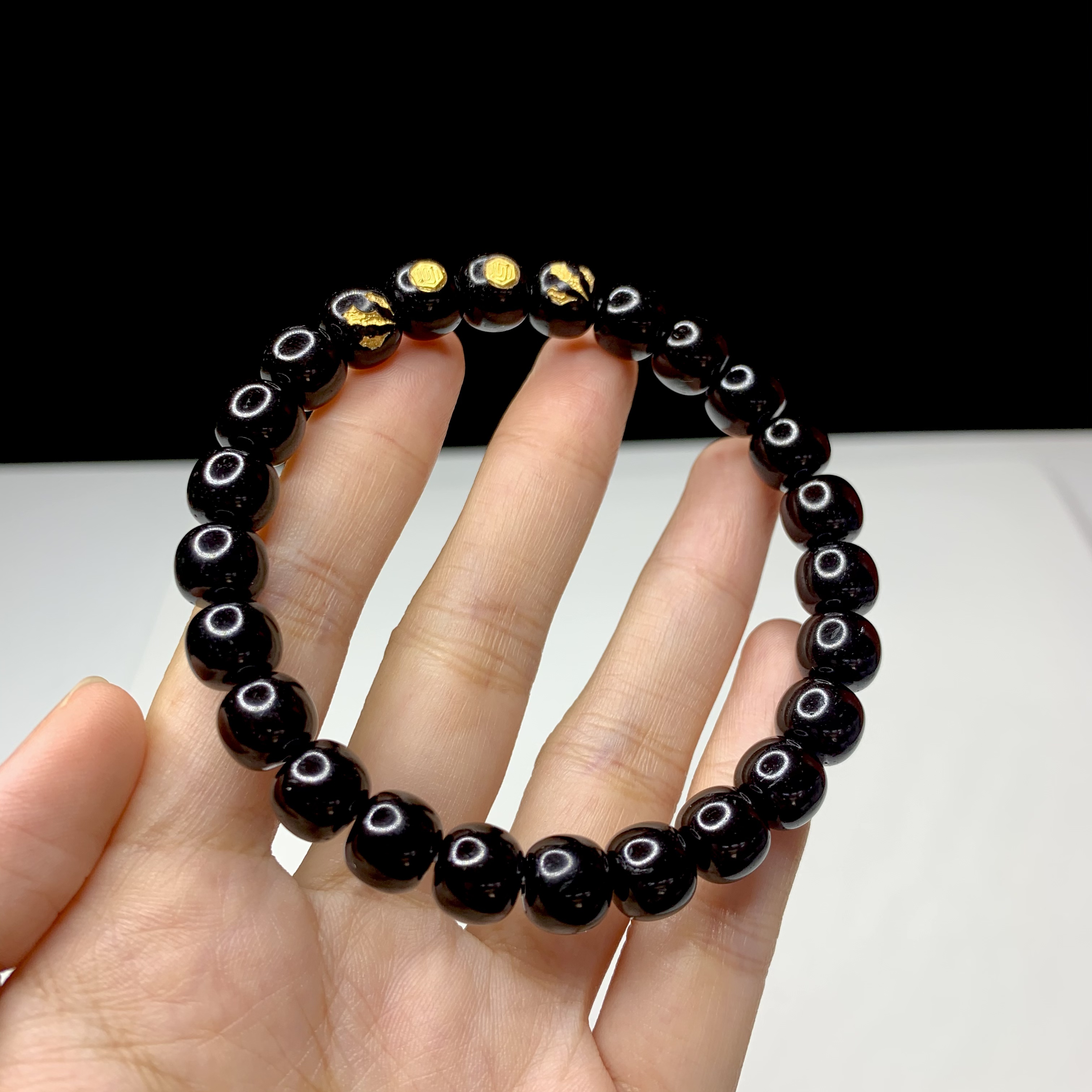 无品牌印尼黑金椰蒂8-7单圈手串个性四颗金款珠