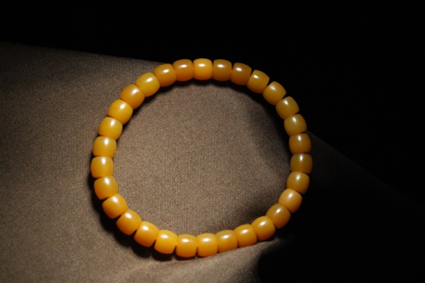 极限弧天然缅甸黄玉玉化7×6mm直切手串 男女同款手串 重量：14.6g