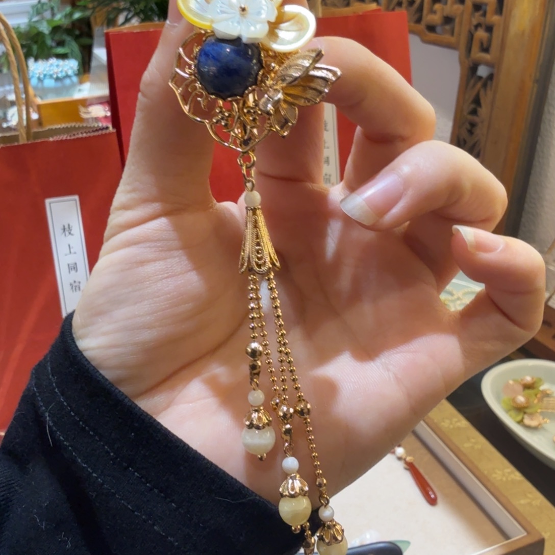 皮质铜合金黄贝发夹一支