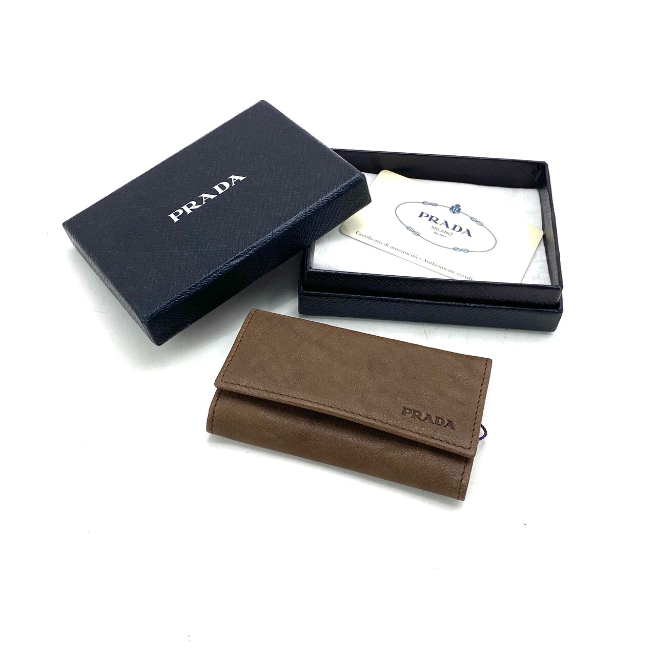 全新未使用 Prada/普拉达 灰棕色全皮钥匙包 尺寸11/6 