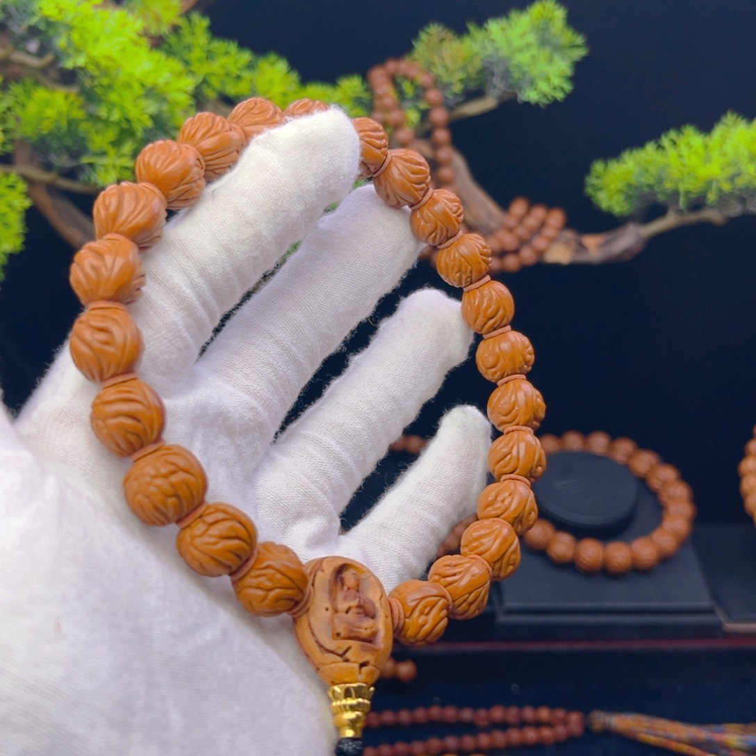 胜***）吊坠桃核野生桃核