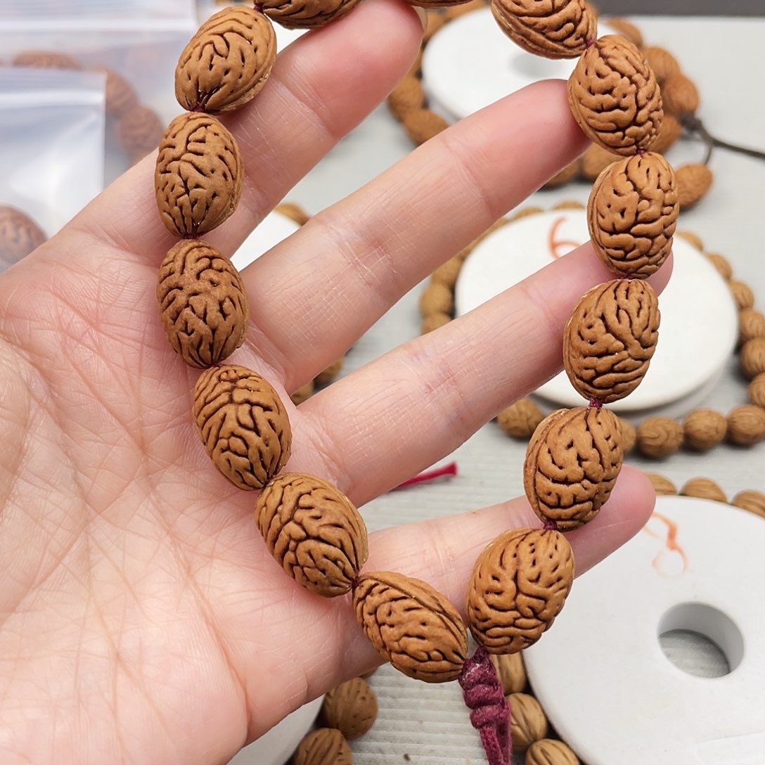 风***莹11.6尺寸野生桃核金蝉手持