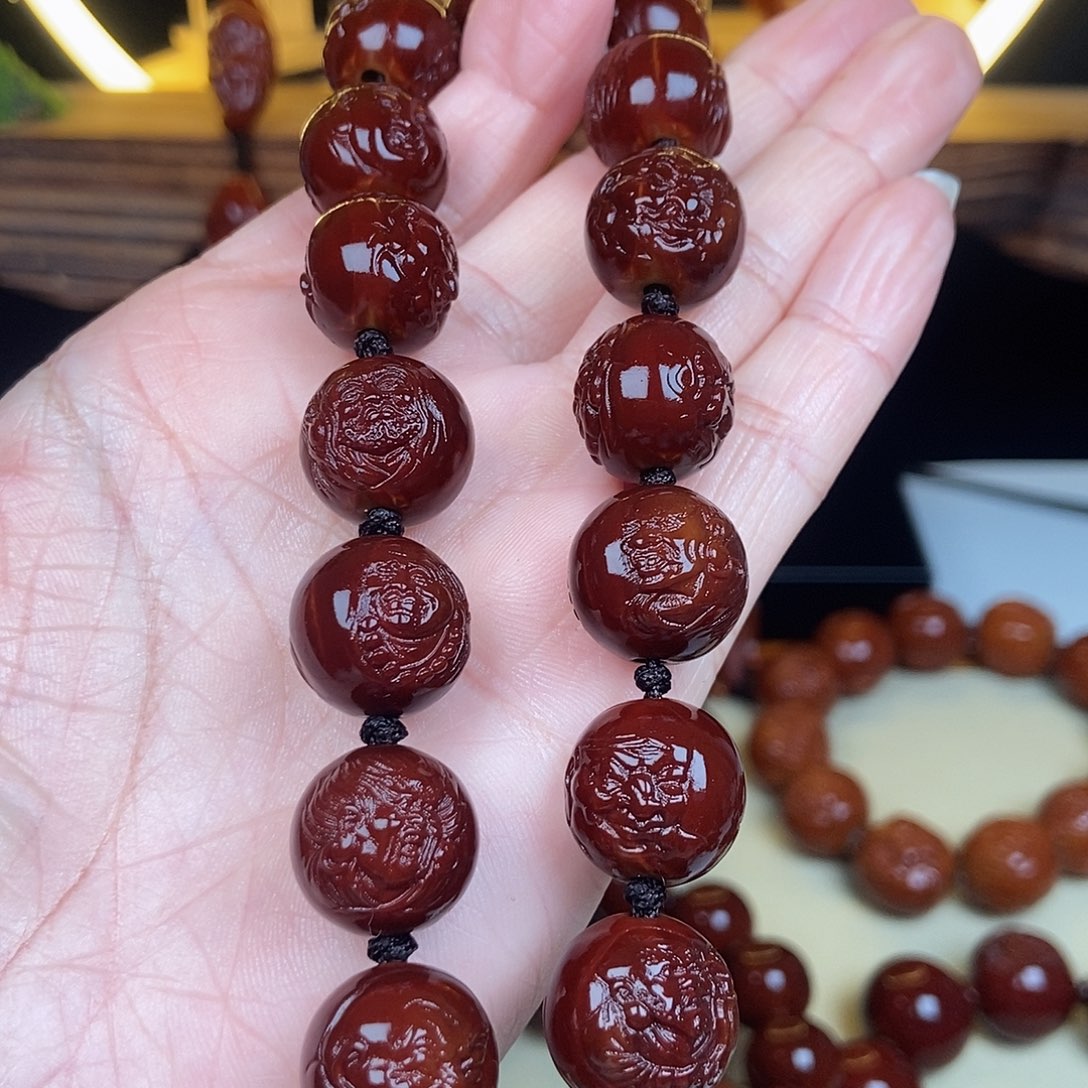 橄榄核吊坠种*的罗汉手持