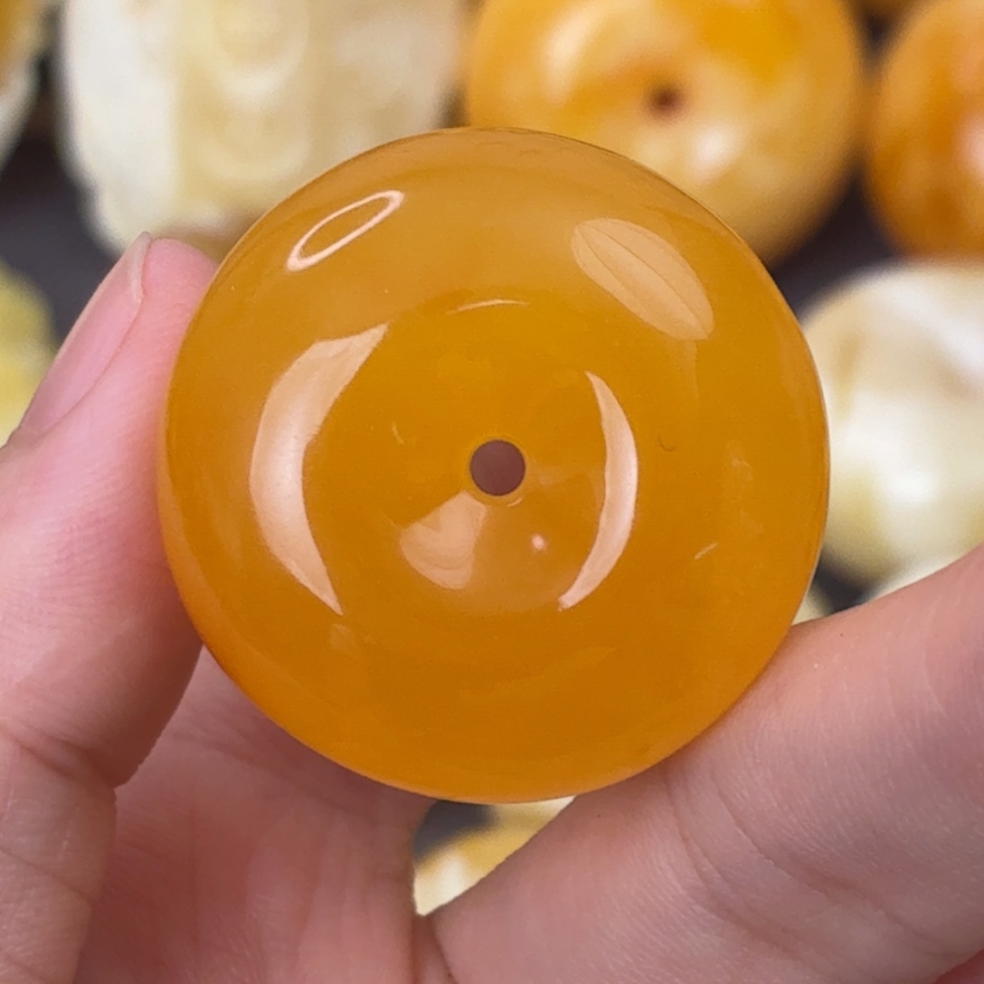 裸石琥珀未镶嵌橘红扣子