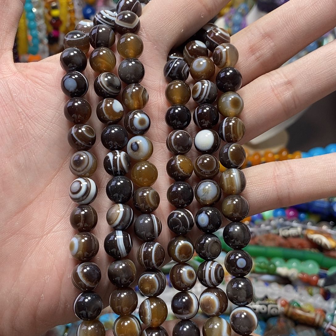 石英质玉未镶嵌，咖色带眼缠丝玛瑙10mm，